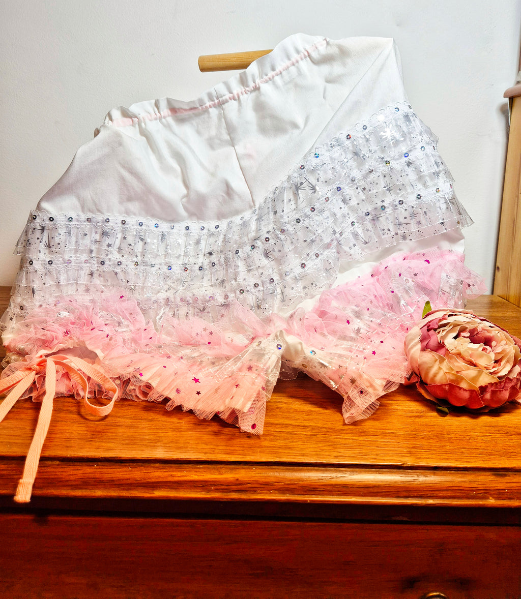 Rear view of dolly drawers, white and pink lace ruffles on white cotton shorts. Drawstring waist band and drawstring leg aperture. sissy knickers, adult baby nappy cover, victorian style drawers, unisex