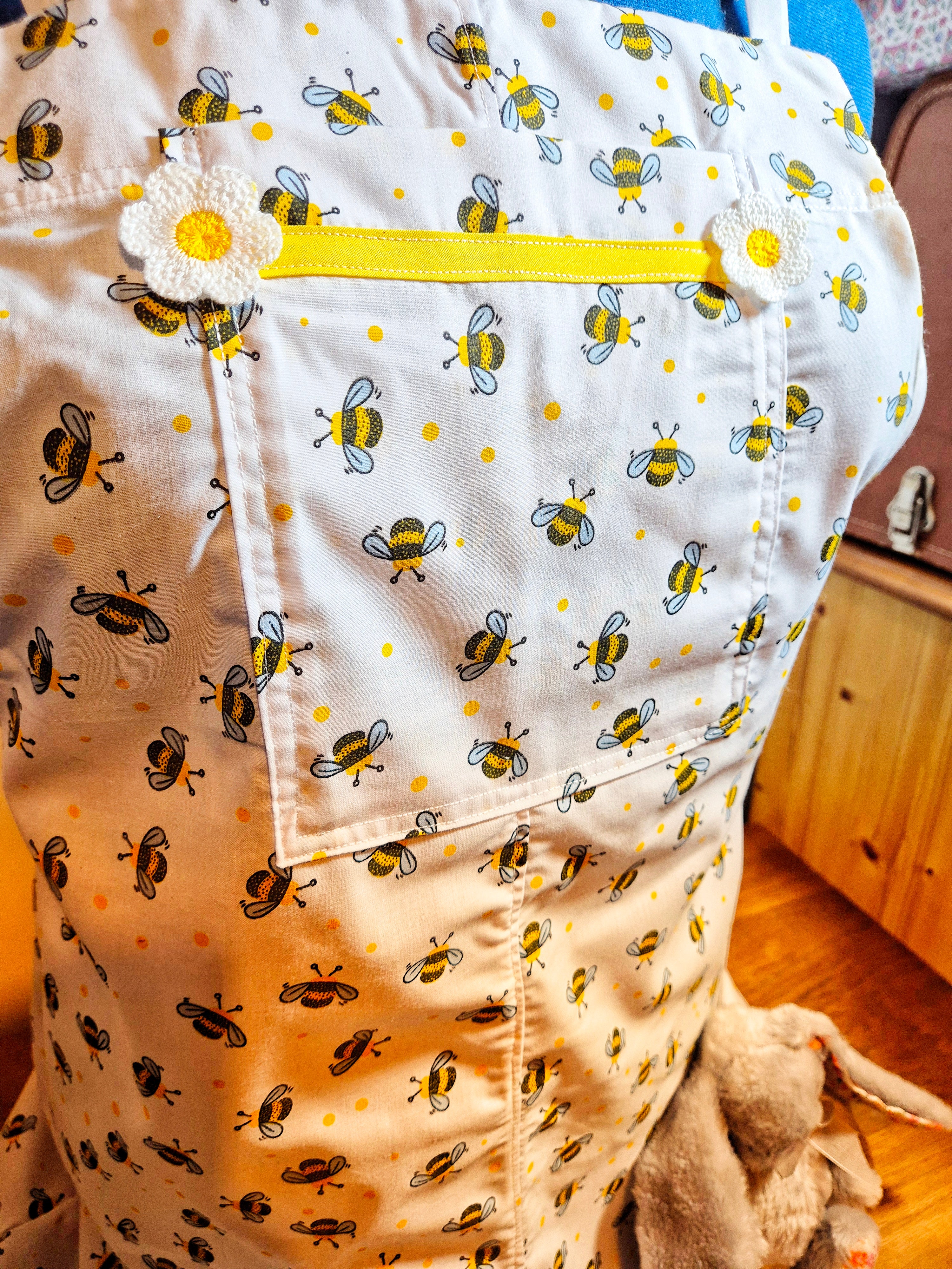 Front pocket and decal detail on patty playsuit. Adult baby. Age play
