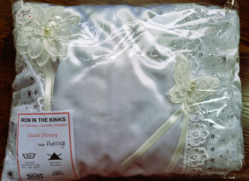 White satin sissy/adult baby dress with white satin ruffles and white accents. 
